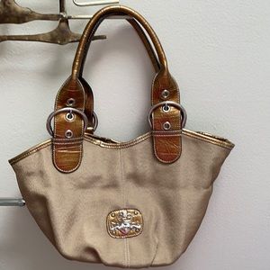 NEW Kathy Van Zeeland Purse. Color is gold/bronze